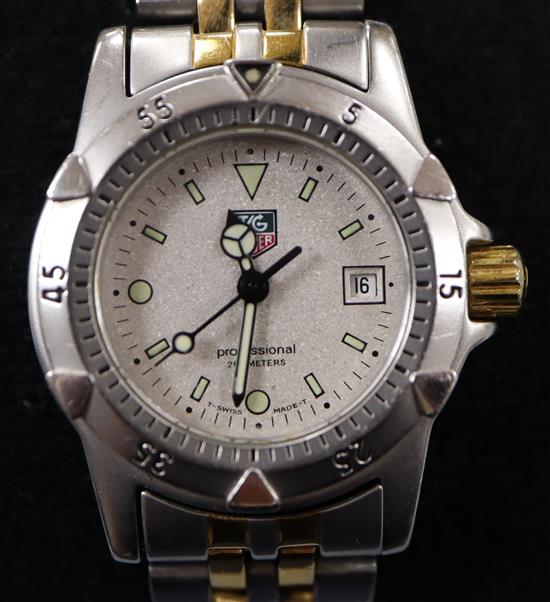 A ladys stainless steel and gold plated Tag Heuer Professional quartz wrist watch, WD-1421-PO, in Tag Heuer box.